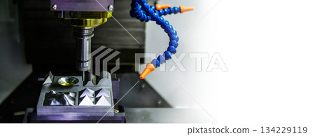 Rotary axis CNC milling machine during deburring of engine parts, heavy industry plan, copy space 134229119