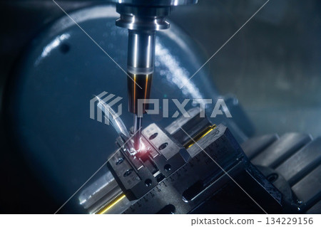 Spindle cutting tool Rotary 5-axis CNC milling machine during deburring of engine parts, heavy industry plan 134229156