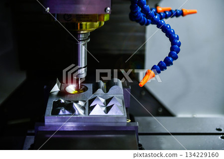 Spindle cutting tool Rotary 5-axis CNC milling machine during deburring of engine parts, heavy industry plan 134229160