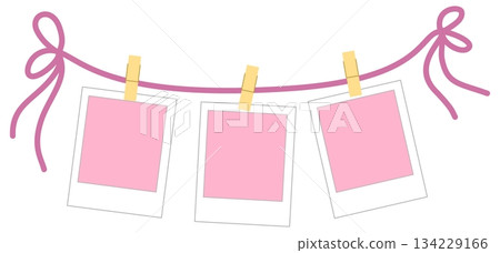 Three Hanging Pink Polaroid Photo Frames on a String with Clothespins, valentine element Three Hanging Pink Polaroid Photo Frames on a String with Clothespins, valentine element 134229166
