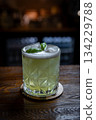 Refreshing green basil cocktail 134229788