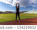 Woman stretching arms 134229832