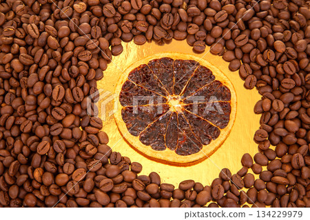 dried orange slices resting on roasted coffee beans, perfect for coffee lovers dried orange slices resting on roasted coffee beans, perfect for coffee lovers 134229979