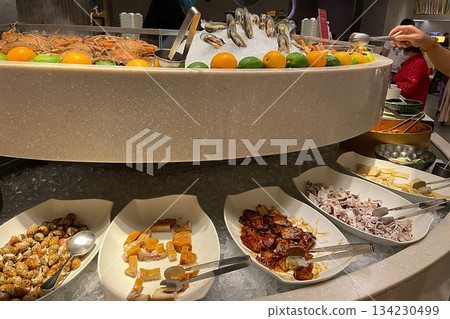 Seafood and appetizer buffet display Seafood and appetizer buffet display 134230499