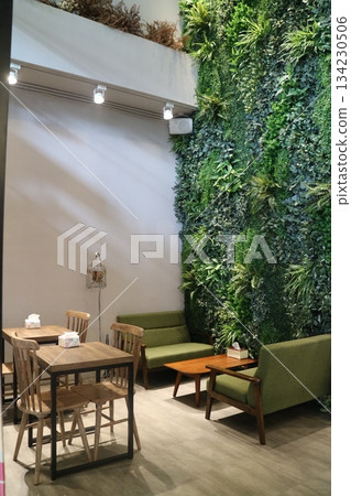 The interior of the building is decorated with green Japanese wooden furniture. 134230506
