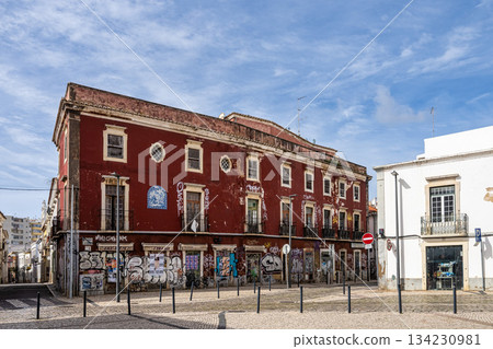 Ancient building with colorful graffiti in the historic center o 134230981