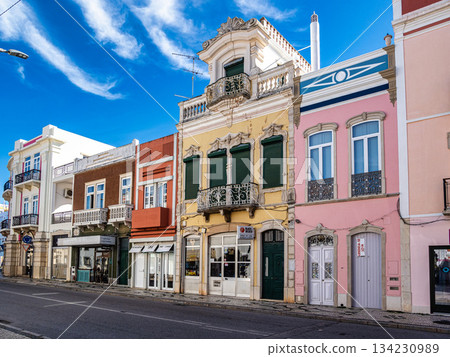 Loule, Portugal - Feb 17, 2025: Picturesque houses in the historic center of Loule, Algarve region in Portugal Loule, Portugal - Feb 17, 2025: Picturesque houses in the historic center of Loule, Algarve region in Portugal 134230989