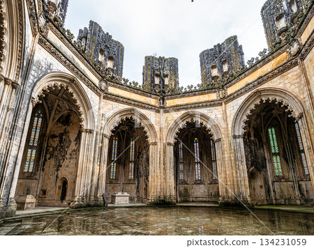 Batalha, Portugal - Mar 07, 2025: The Unfinished Chapels of Monastery of Batalha at Batalha, Portugal. Batalha, Portugal - Mar 07, 2025: The Unfinished Chapels of Monastery of Batalha at Batalha, Portugal. 134231059