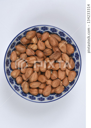 Hazelnuts in Blue Bowl 134233314