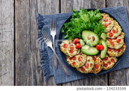 minced chicken cherry tomatoes patties on a plate minced chicken cherry tomatoes patties on a plate 134233599