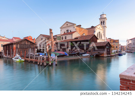 Gondola workshop and canal in Venice Italy Gondola workshop and canal in Venice Italy 134234245