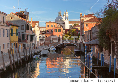 Canal with traditional buildings in Venice Italy Canal with traditional buildings in Venice Italy 134234251