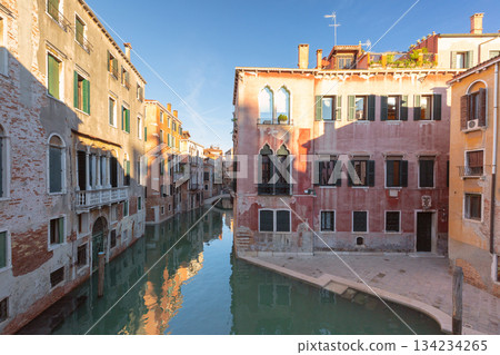 Canal with traditional buildings in Venice Italy Canal with traditional buildings in Venice Italy 134234265