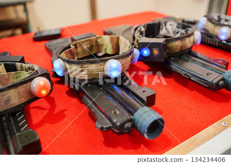 Laser tag equipment on display at an indoor venue Laser tag equipment on display at an indoor venue 134234406