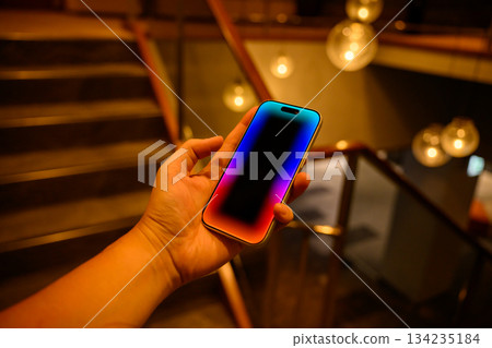 Smartphone in hand and stairs at night Smartphone in hand and stairs at night 134235184