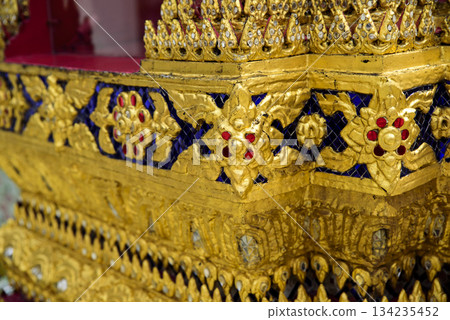 The gold and blue design on the table is ornate and intricate 134235452