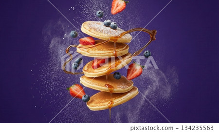 Flying Stack Of Pancakes With Berries And Honey Syrup Art 134235563