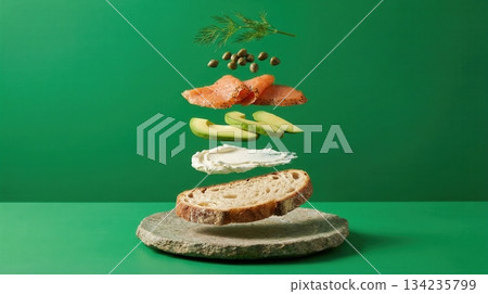 Deconstructed Salmon And Avocado Toast Ingredients green background Deconstructed Salmon And Avocado Toast Ingredients green background 134235799