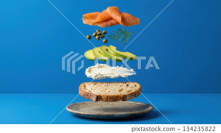 Deconstructed Salmon And Avocado Toast Ingredients blue background 134235822