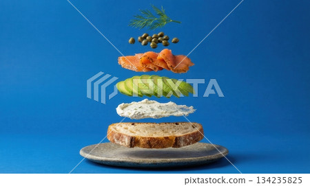 Deconstructed Salmon And Avocado Toast Ingredients blue background Deconstructed Salmon And Avocado Toast Ingredients blue background 134235825