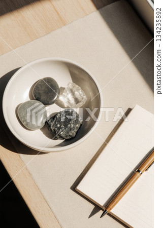 Crypto Storage Types as Natural Stones in Ceramic Bowl Crypto Storage Types as Natural Stones in Ceramic Bowl 134235892