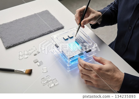 Hands Building Physical Model of Blockchain Validator Node Hands Building Physical Model of Blockchain Validator Node 134235893