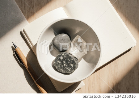 Crypto Storage Types as Natural Stones in Ceramic Bowl Crypto Storage Types as Natural Stones in Ceramic Bowl 134236016