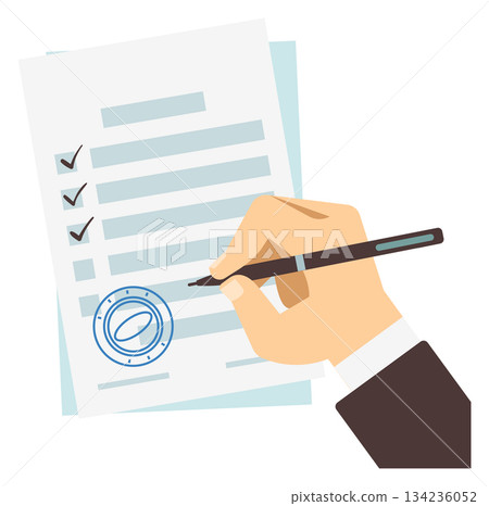 A hand is writing on a piece of paper with a pen 134236052