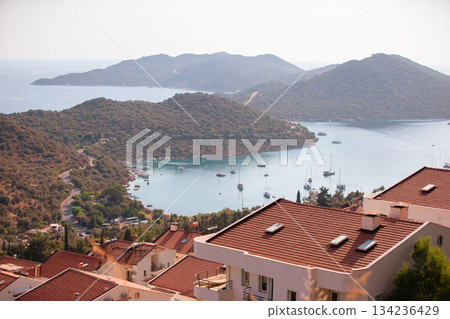 Beautiful coastal town with small white houses taken from above. Houses by the sea. 134236429