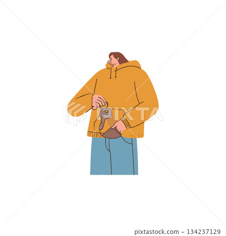 Woman retrieving keys from her hoodie pocket displays simple everyday actions with minimal 134237129