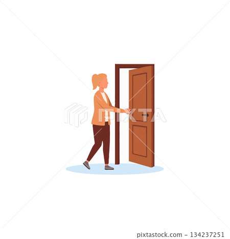A woman gracefully opens a wooden door into opportunity presenting exploration toward a 134237251