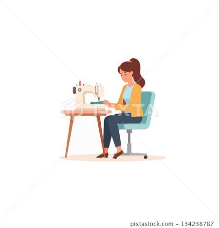 Enthusiastic young woman absorbed in her craft using sewing machine at table creating design 134238787