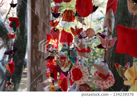 Fabric decorations swaying from the trees, creating a spring landscape adorned with handicrafts 134239376