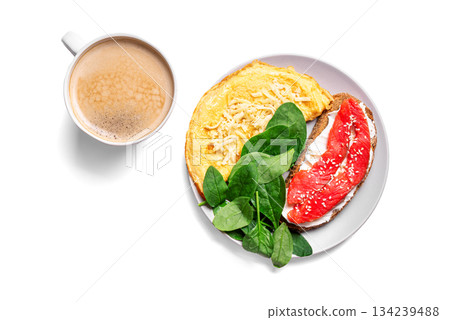 Healthy breakfast plate. Omelette, sandwich with salmon, spinach. Healthy breakfast plate. Omelette, sandwich with salmon, spinach. 134239488