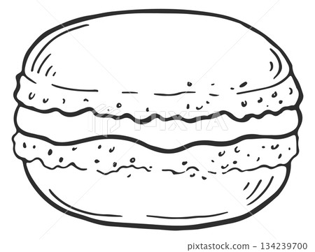 A close up of a macaron with a cream filling A close up of a macaron with a cream filling 134239700