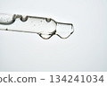 Pipette tip dispensing transparent cosmetic serum drops 134241034