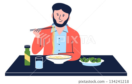 A man is eating noodles with chopsticks 134241218