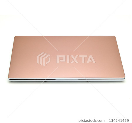 A laptop with a pink cover 134241459
