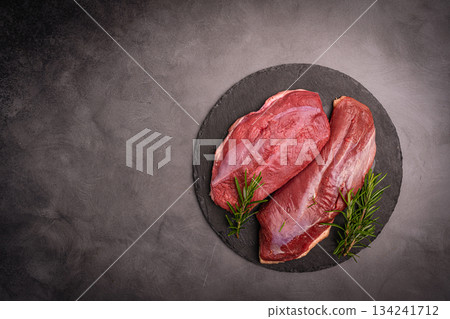 Preparation for cooking raw duck breast Preparation for cooking raw duck breast 134241712