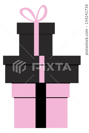 A stack of boxes with a pink bow on top A stack of boxes with a pink bow on top 134241738