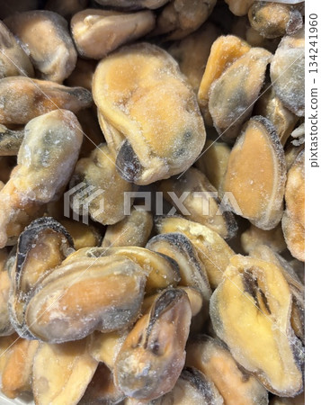 Top view of frozen mussels, seafood concept, keto diet ingredients, healthy marine food Top view of frozen mussels, seafood concept, keto diet ingredients, healthy marine food 134241960