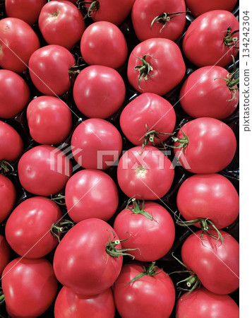 Red tomatoes. Vegetables at grocery store 134242304