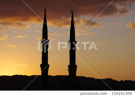 Evening clouds and two minarets of mosque in Sharm El Sheikh, Egypt 134242309