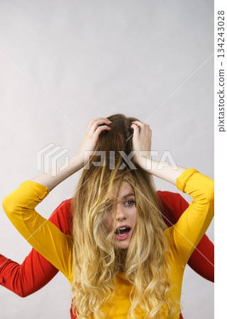 Two girls creating hairdo. Hair ombre color Two girls creating hairdo. Hair ombre color 134243028
