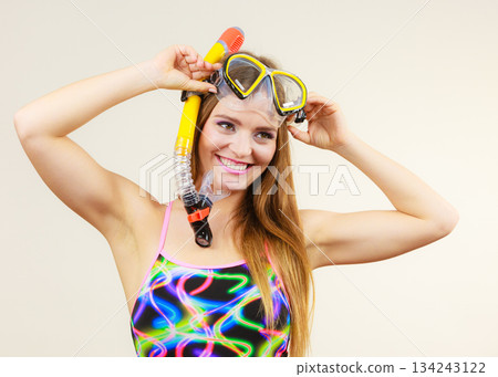 Woman with snorkeling mask having fun Woman with snorkeling mask having fun 134243122