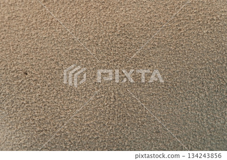 Textured surface of fabric in natural light showing soft fibers Textured surface of fabric in natural light showing soft fibers 134243856