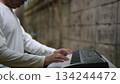 Peaceful Musicians Hand Dance White Shirt, Keyboard Keys, Light On Textured Wall 134244472