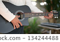Close Up Black Guitarist Playing Acoustic Guitar In White Shirt Musical Body Neck Details 134244488