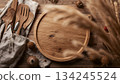 Background material of a warm dining table with wooden tableware and kitchen tools 134245524
