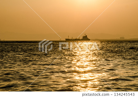 A tanker sailing through the Seto Inland Sea at dusk A tanker sailing through the Seto Inland Sea at dusk 134245543